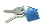 Keys with a keychain shaped like a house